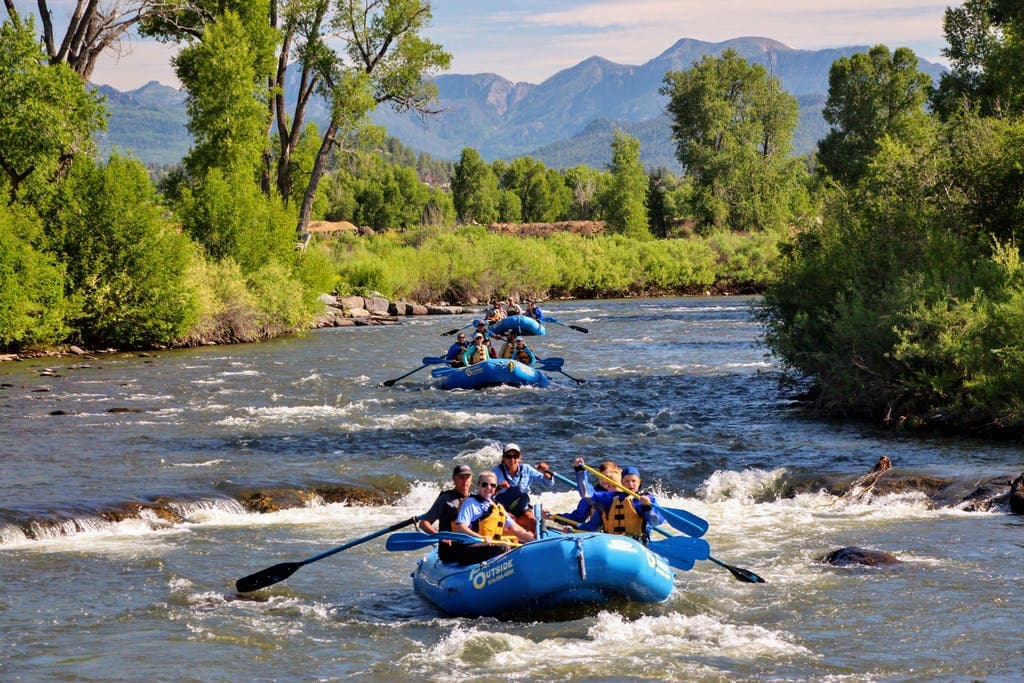 rafters float down the san juan river near pagosa springs photo