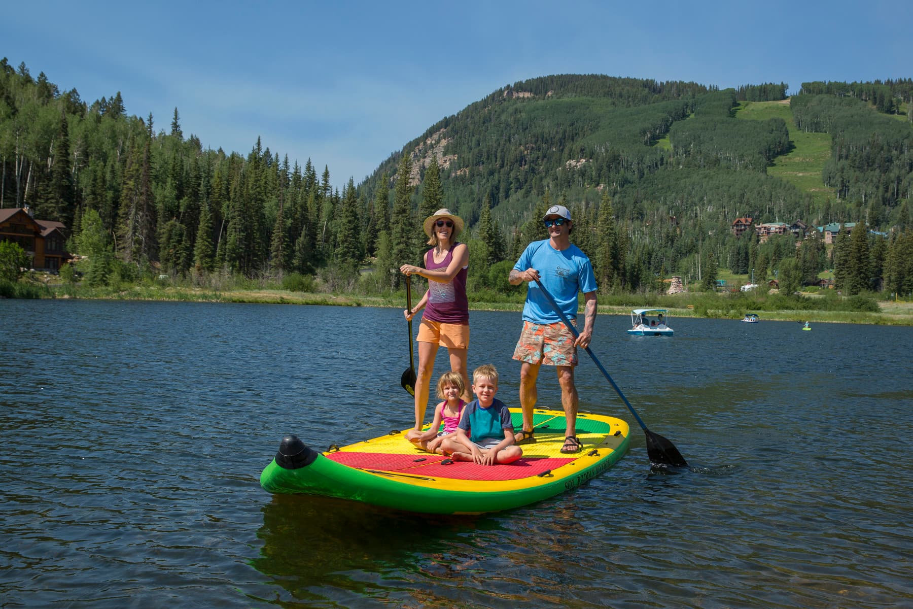 taking the stand up paddleboard out on twilight lake, one of the activities included in the total adventure ticket. photo 4