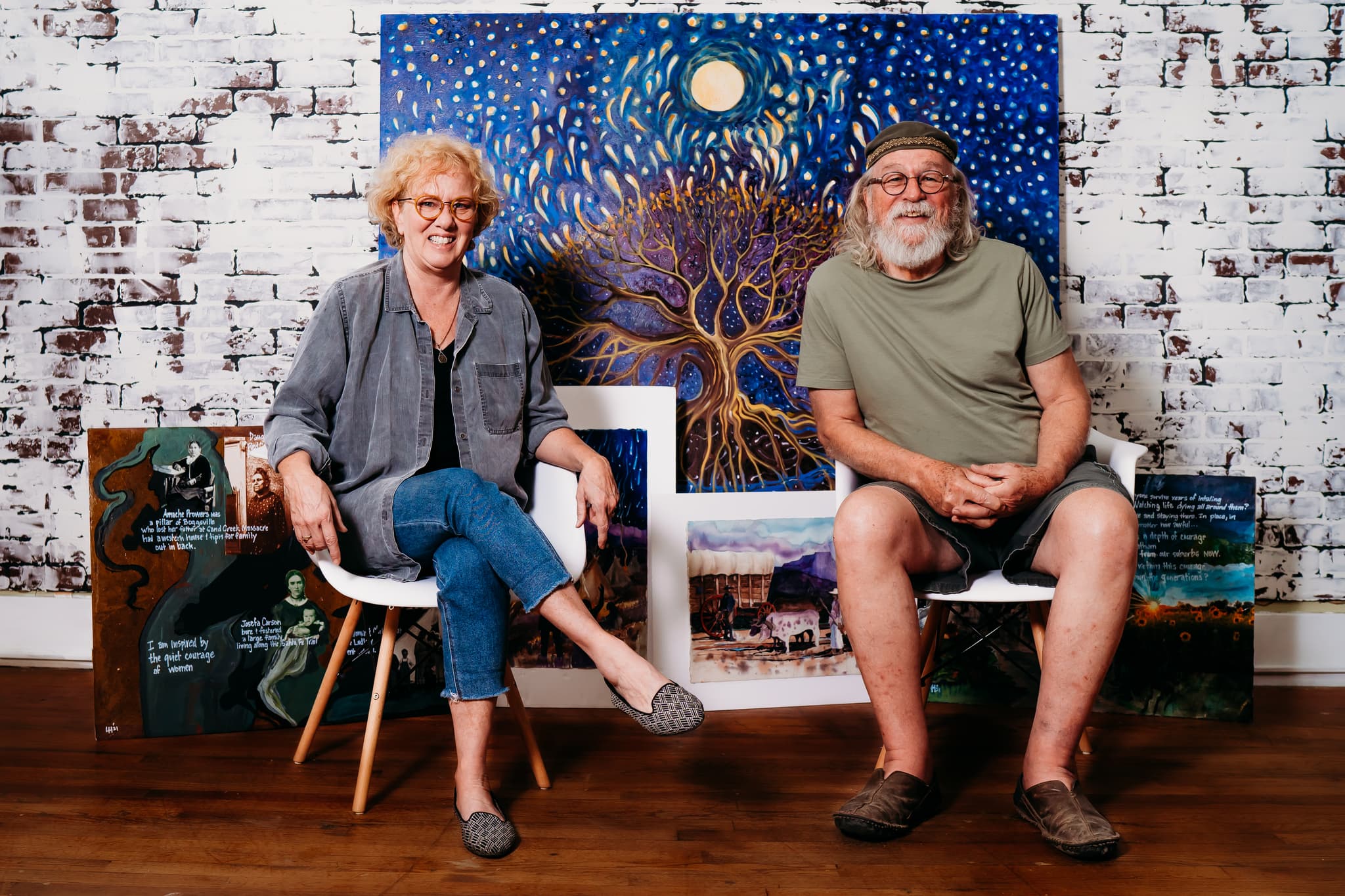 Doug & Lori Holdread with Sand Creek Massacre Story Artwork