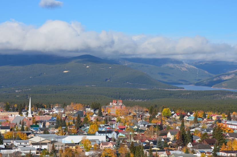 Aerial view of a town with large mountains in the distance