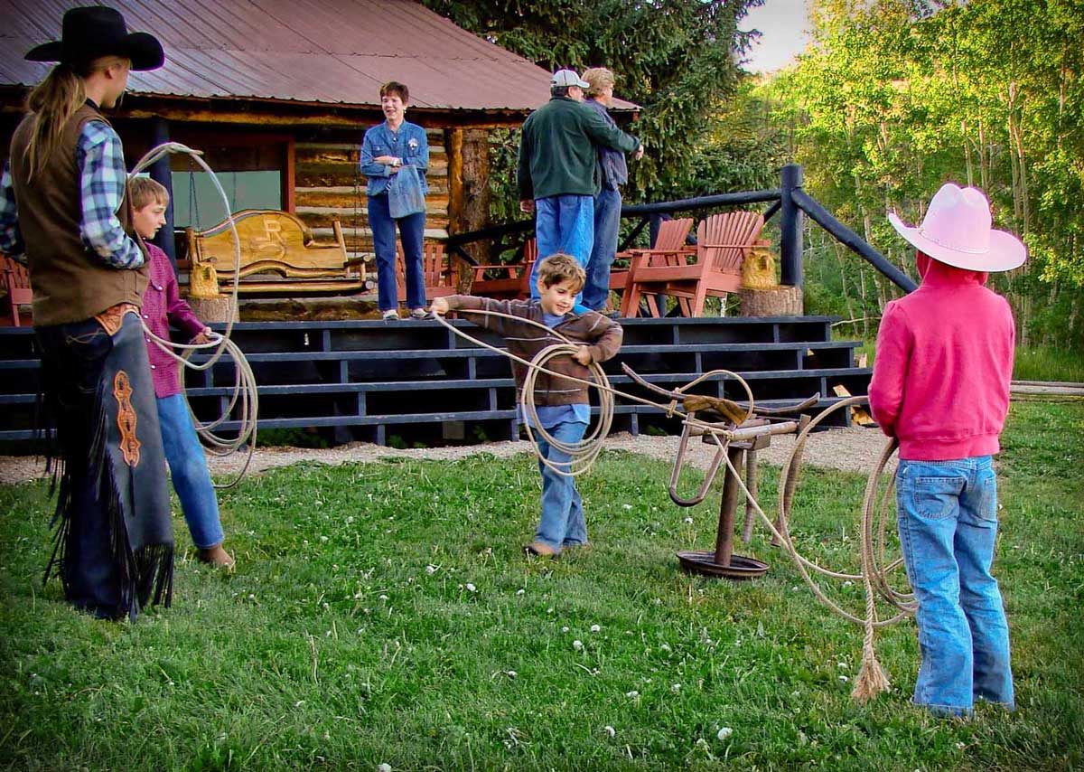 Children practice roping at Latigo Ranch in Colorado