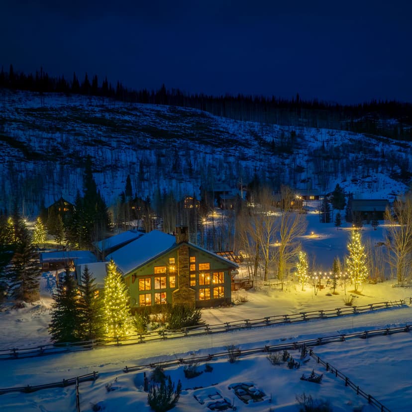 Evening view of glowing lights from Vista Verde Ranch in Colorado