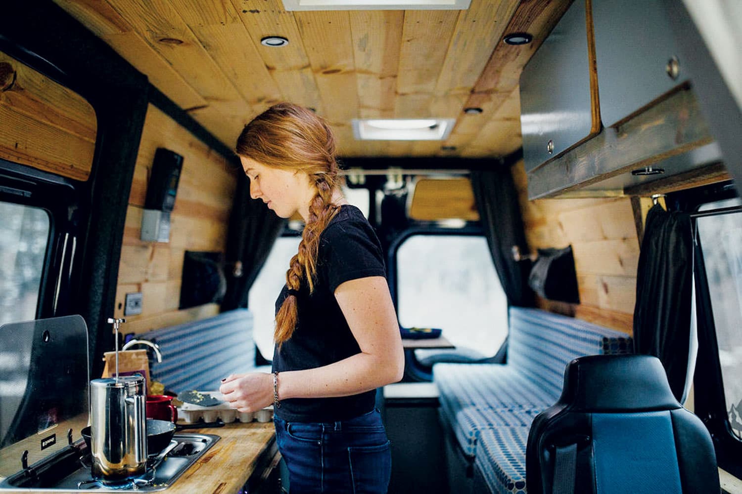 Breakfast on the road in an Aspen Custom Vans campervan