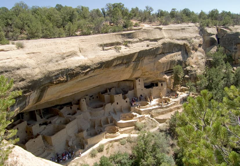 The sun shines down on some of the cliff dwellings inside Mesa Verde National Park near Cortez, Colorado.