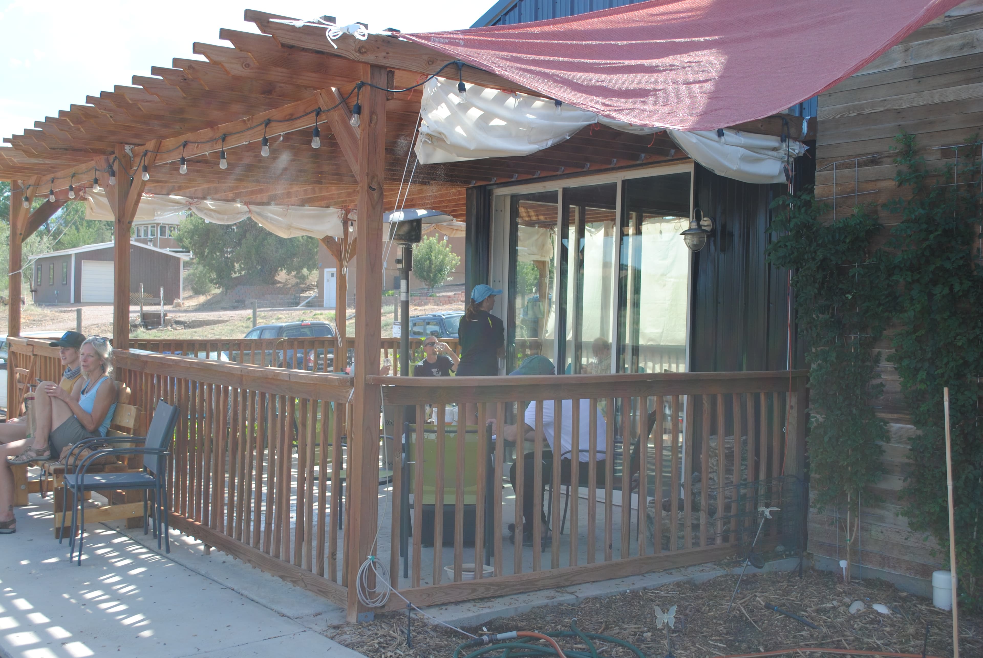 enjoy wine by the glass or bottle on the patio photo
