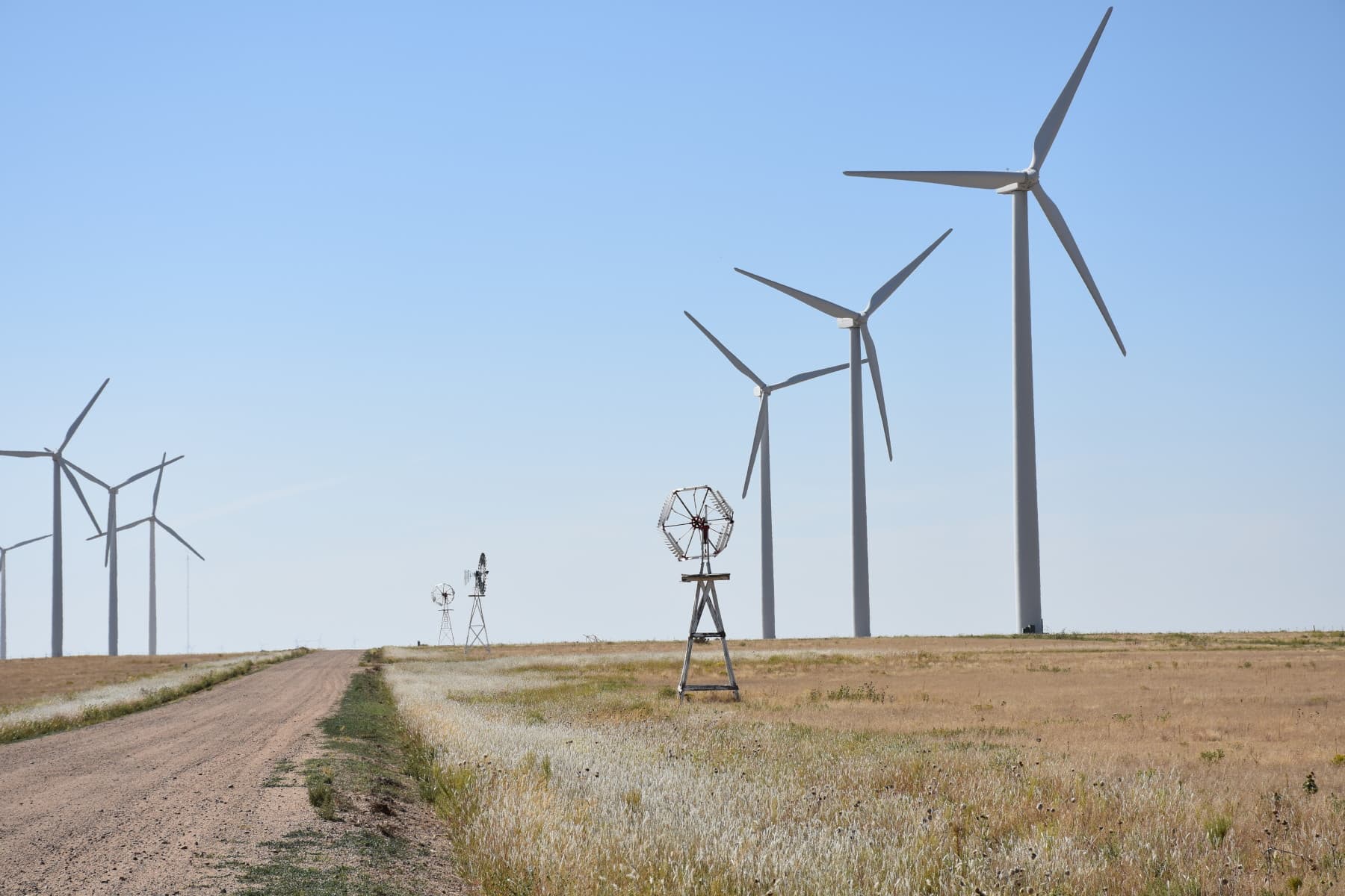 windmills in the great high prairie photo
