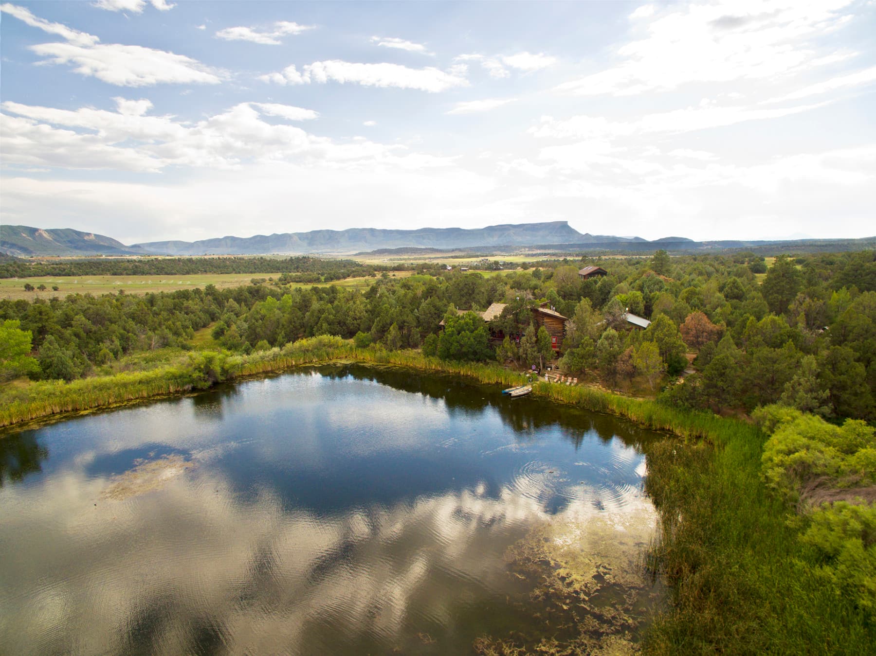 sky view of willowtail springs. our cabins look out to the private lake. photo