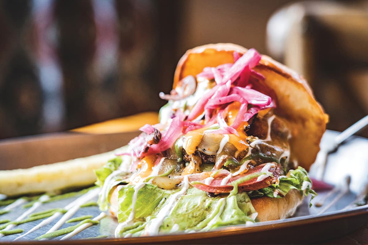 Stacked hamburger with various toppings from Murphy's Mountain Grill in Evergreen, Colorado.