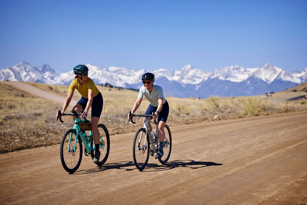 Bikers pedaling along a gravel path near Querida in Colorado.