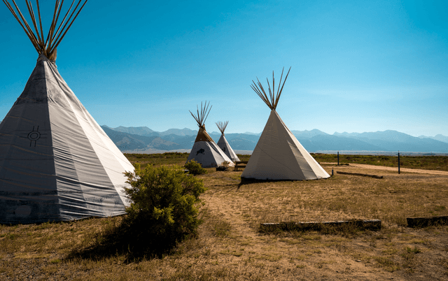 Woman sitting in a spa at Joyful Journey Hot Springs