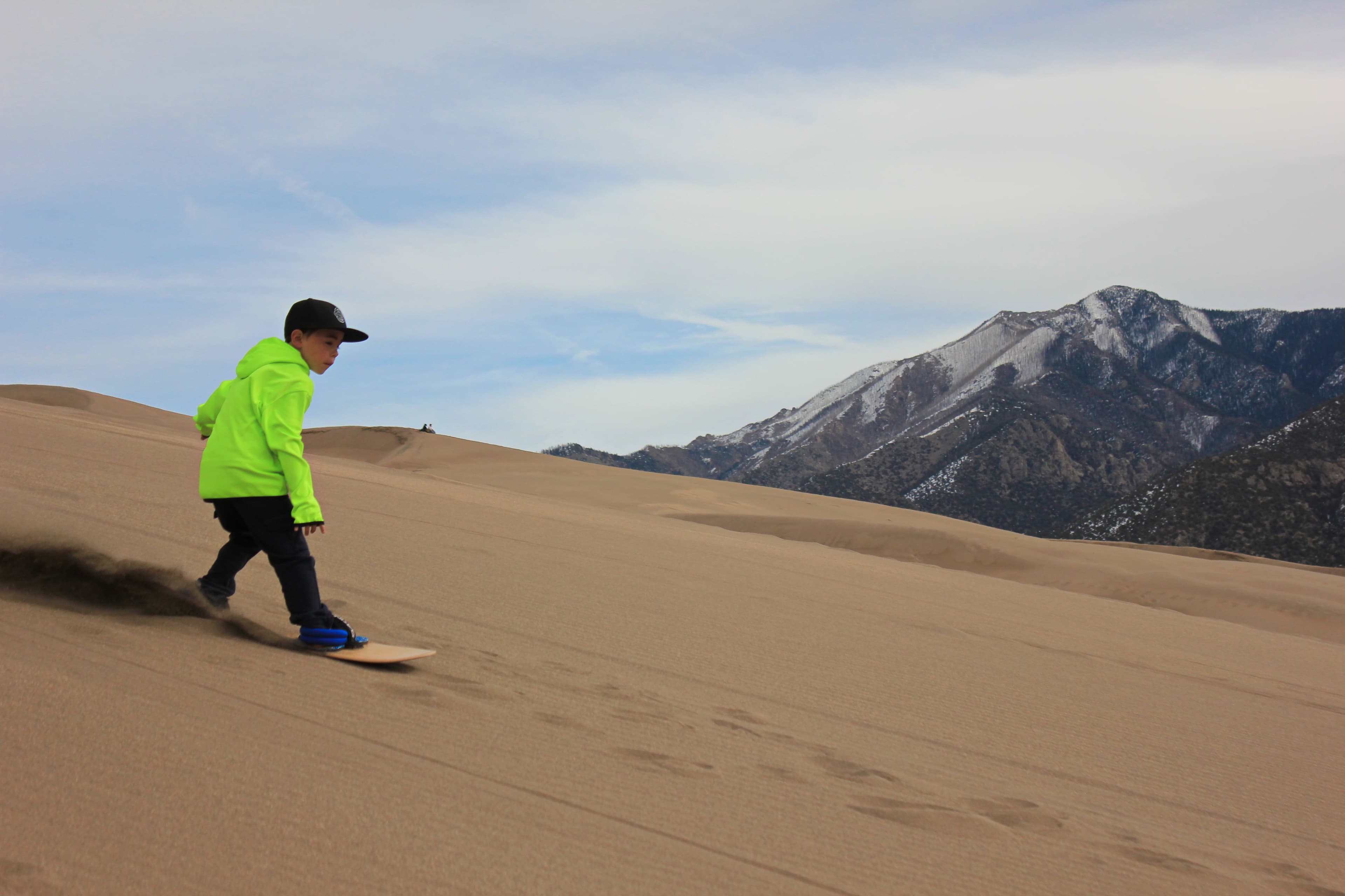 sandboarding the great sand dunes national park photo