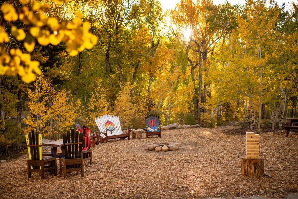 enjoy time with the ones you love relaxing by the creek photo
