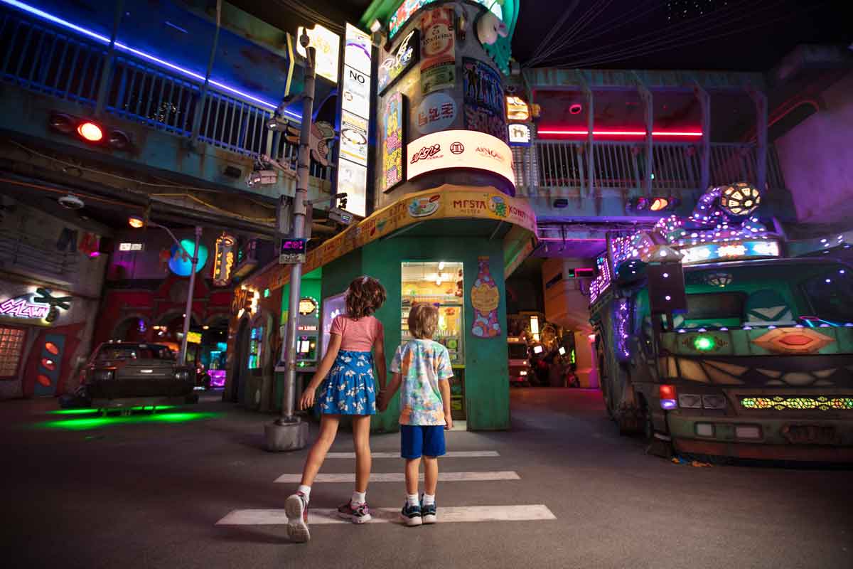 Two kids exploring Meow Wolf