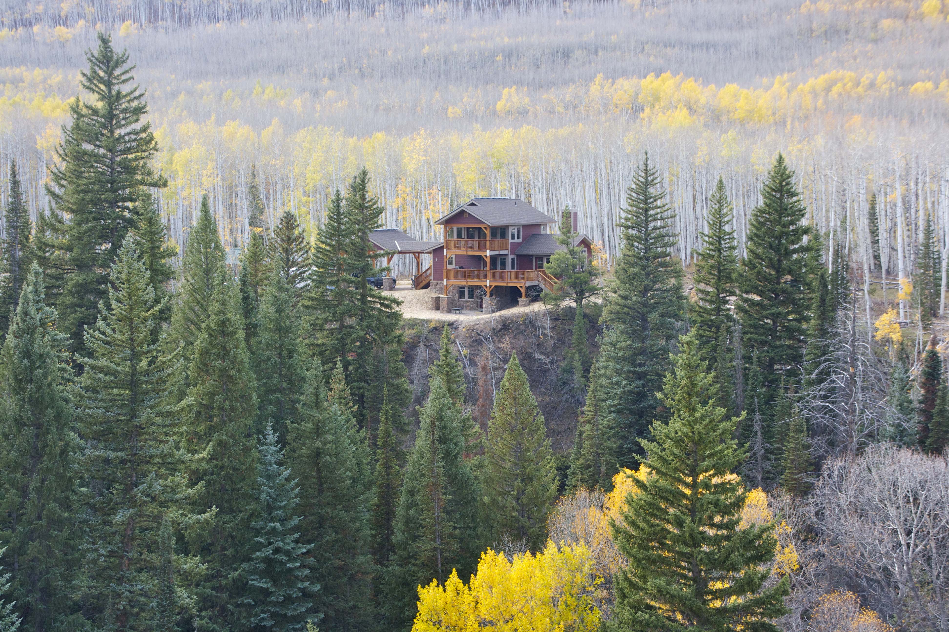 mountain view of secluded cabin home-home to the largest elk herd in the world at 40,000+ elk photo