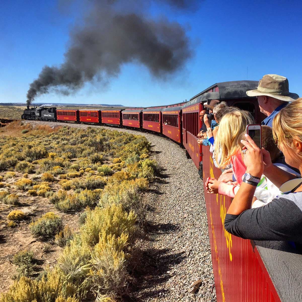Train passengers viewing the surrounding scenery