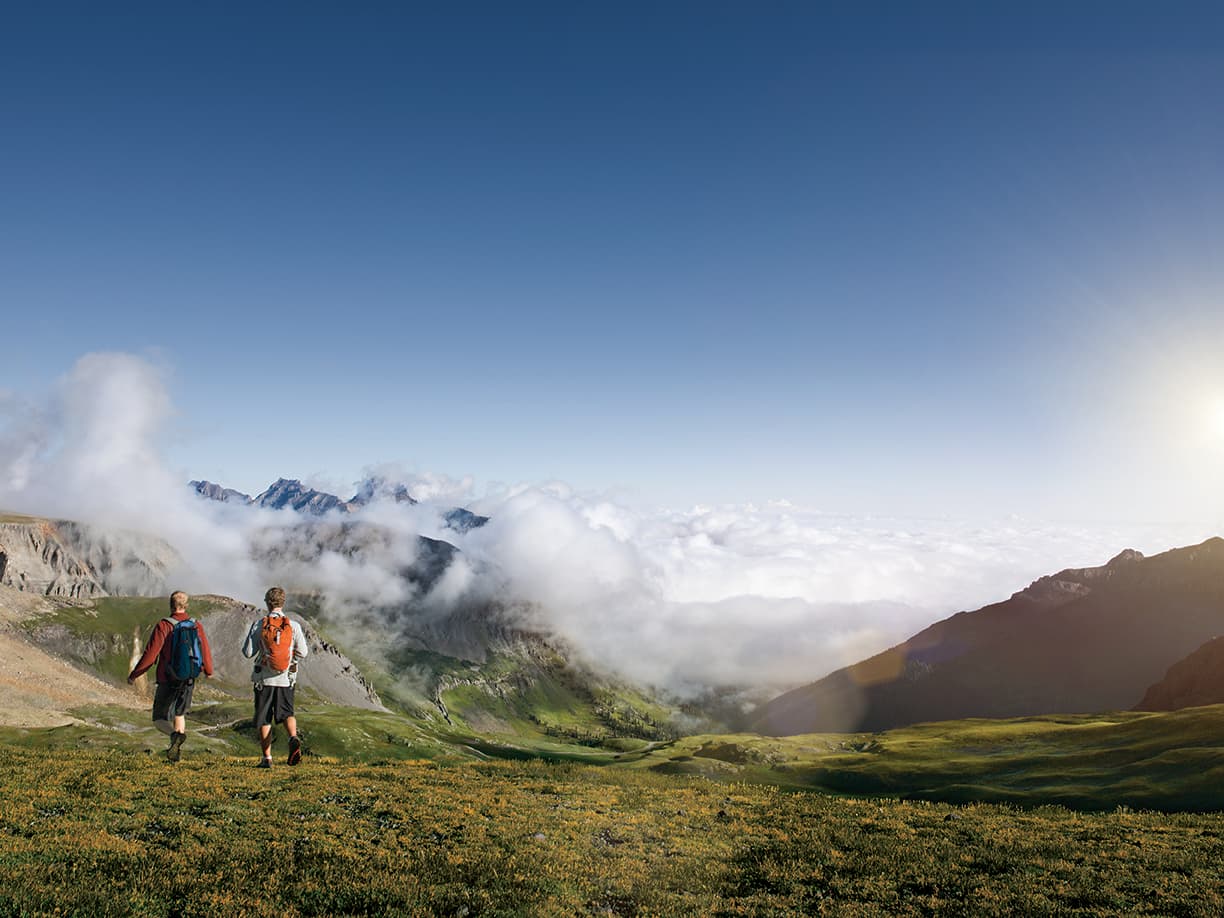 two people hiking in coloradan mountains