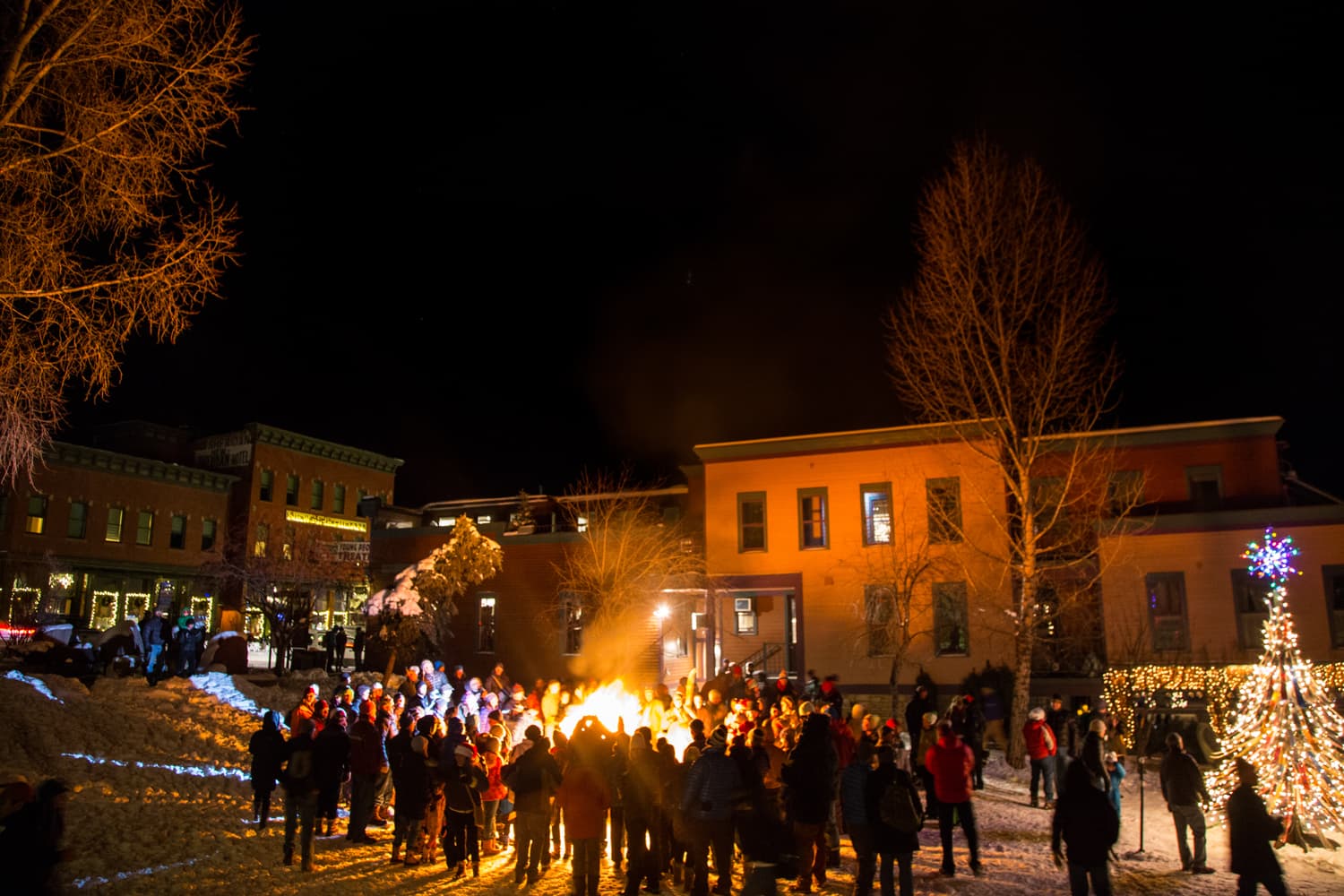 crowd gathered at Ullr's Ceremonial Ski Burning in Telluride at night