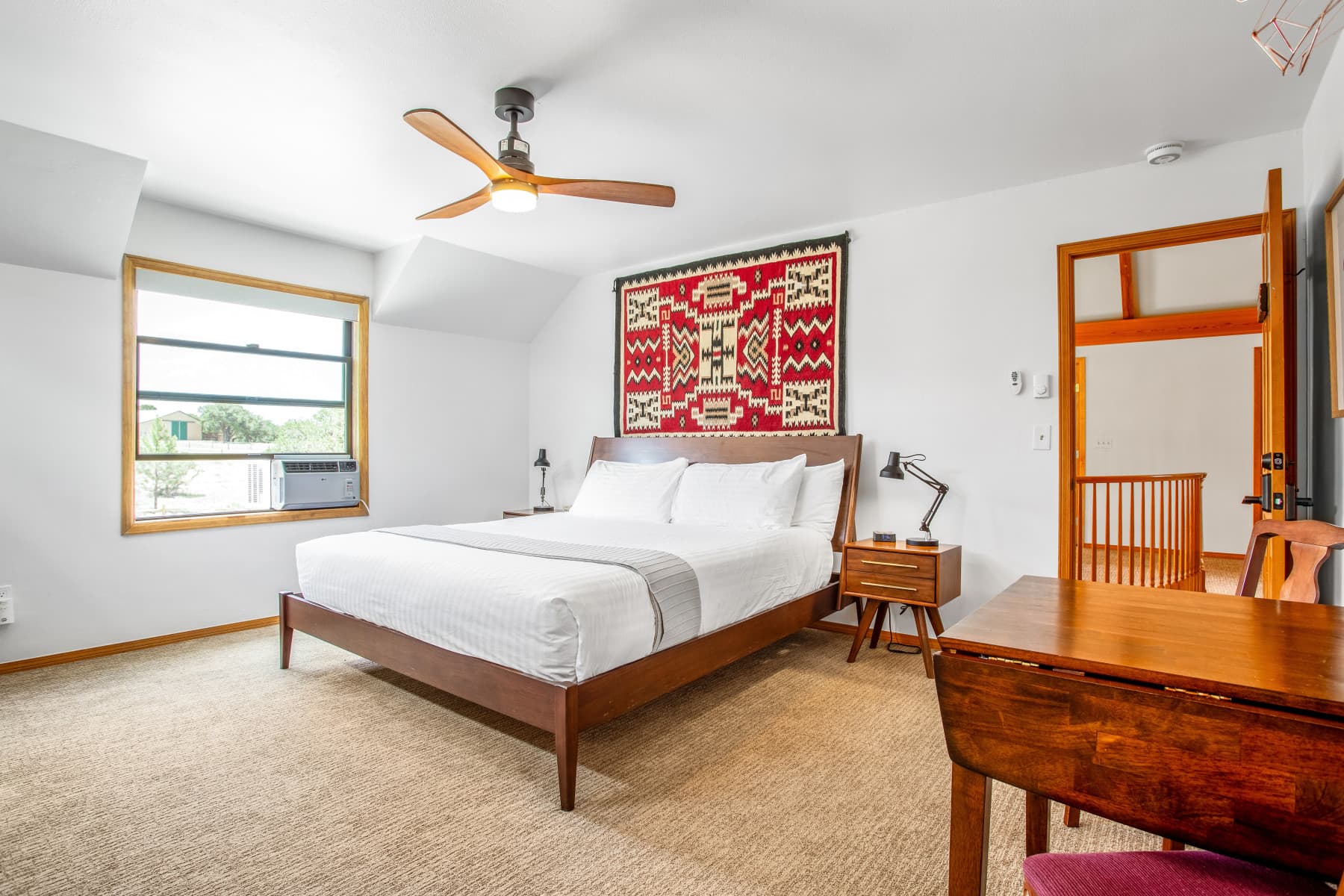 our lodge features six hotel-style rooms, including the rancher suite, pictured. photo 2