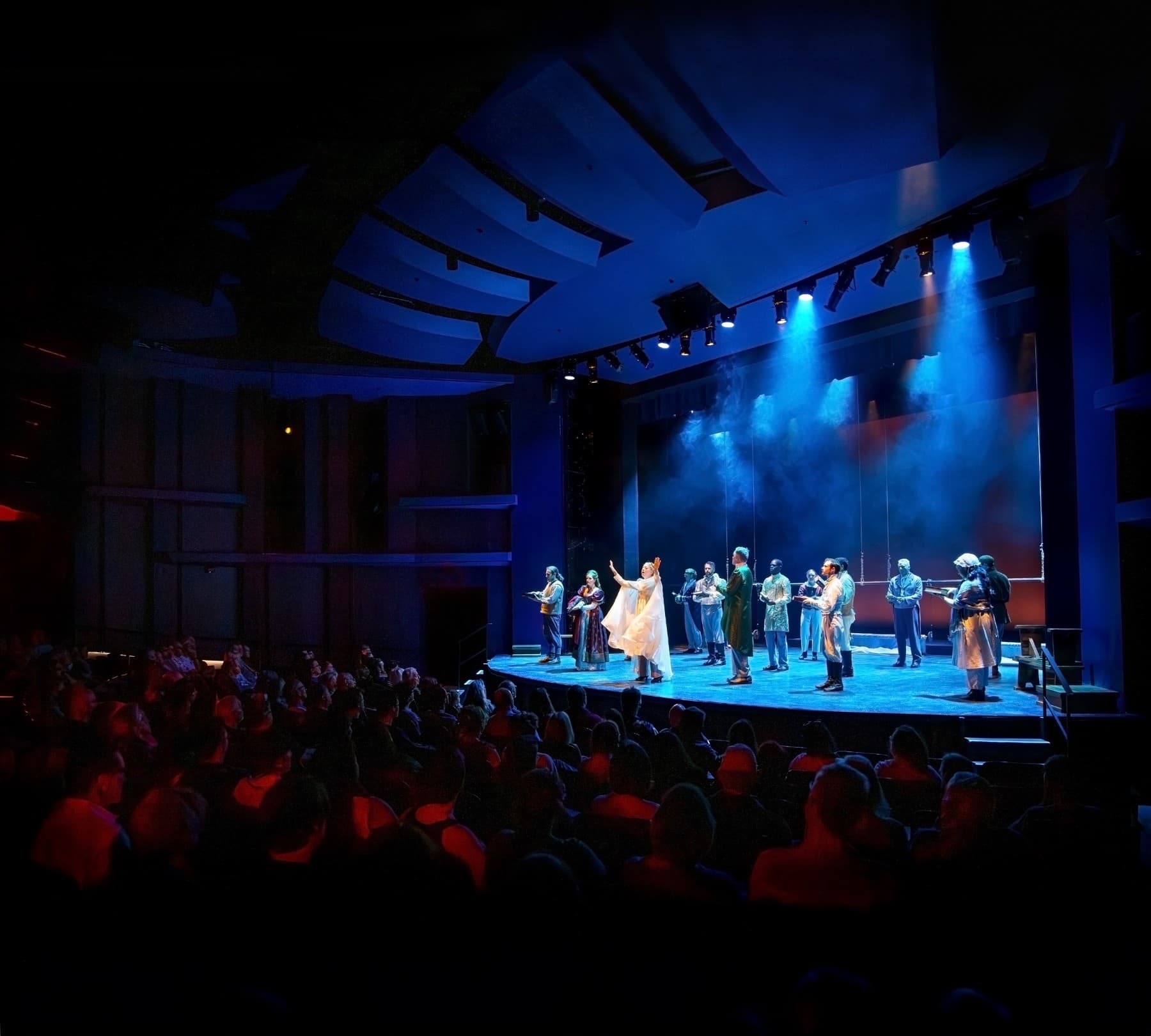actors perform in the roe green theatre. photo