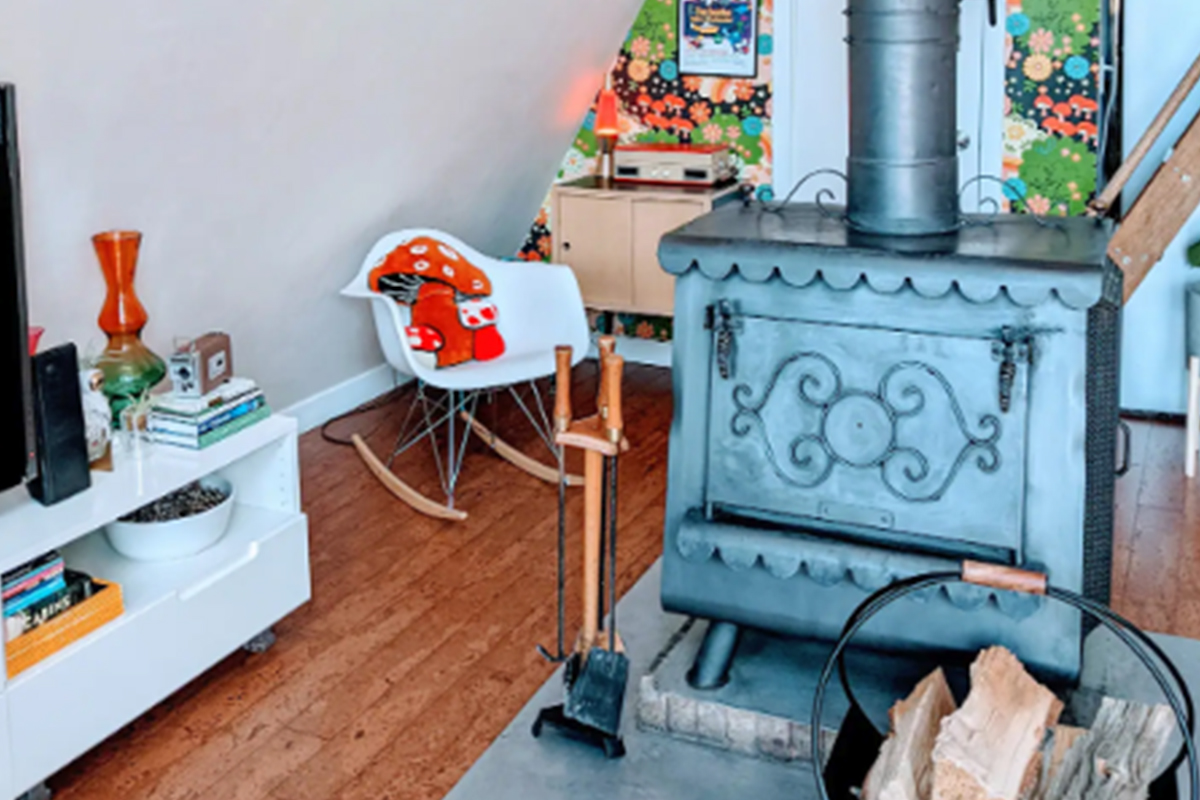 A hard-working metal stove heats a living room during the chilly winter months at a vacation rental near Westcliffe, Colorado.