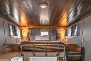 Sleeping loft inside a tiny house on a Hudson, Colorado, horse farm