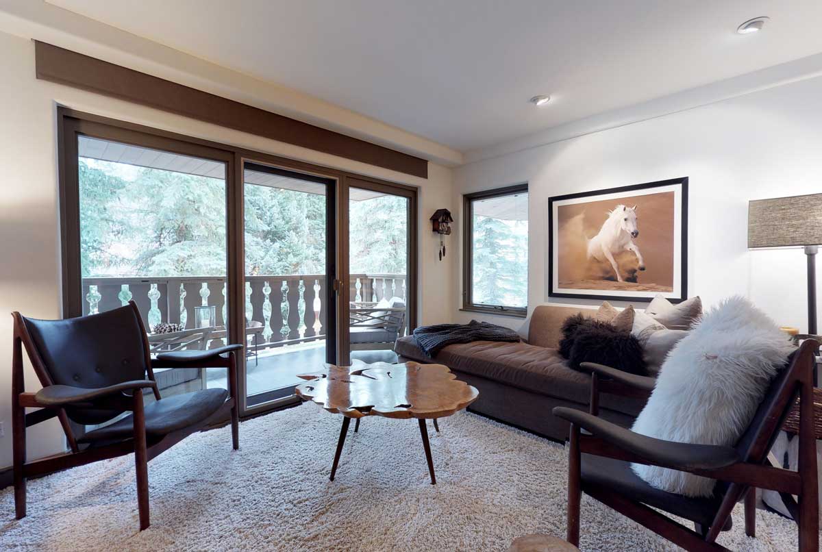 Interior view of a condo living room at Christiania at Vail