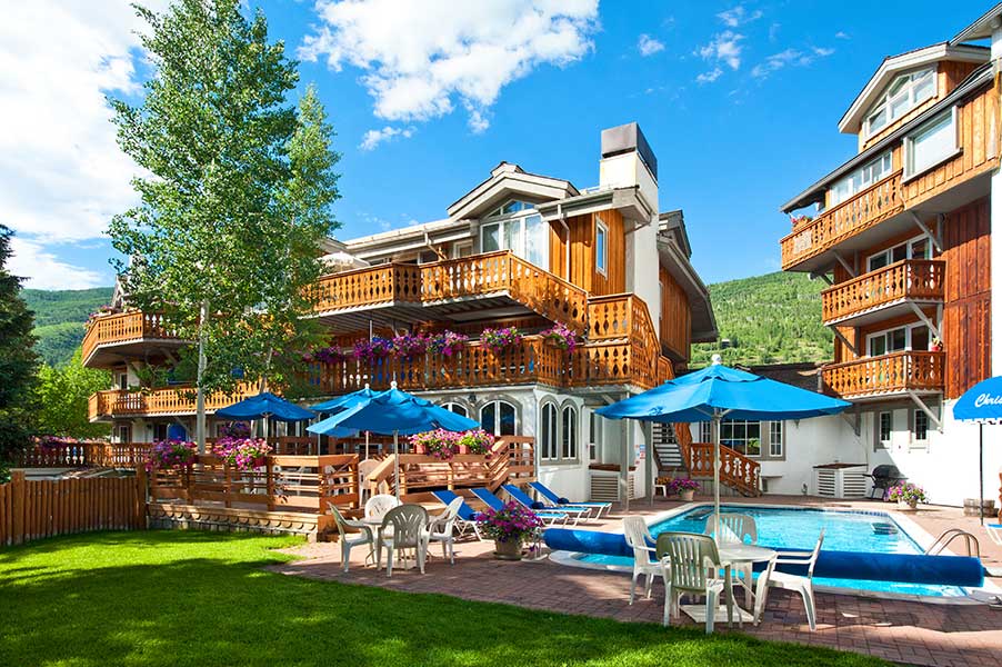 Summer exterior view of Christiania at Vail poolside