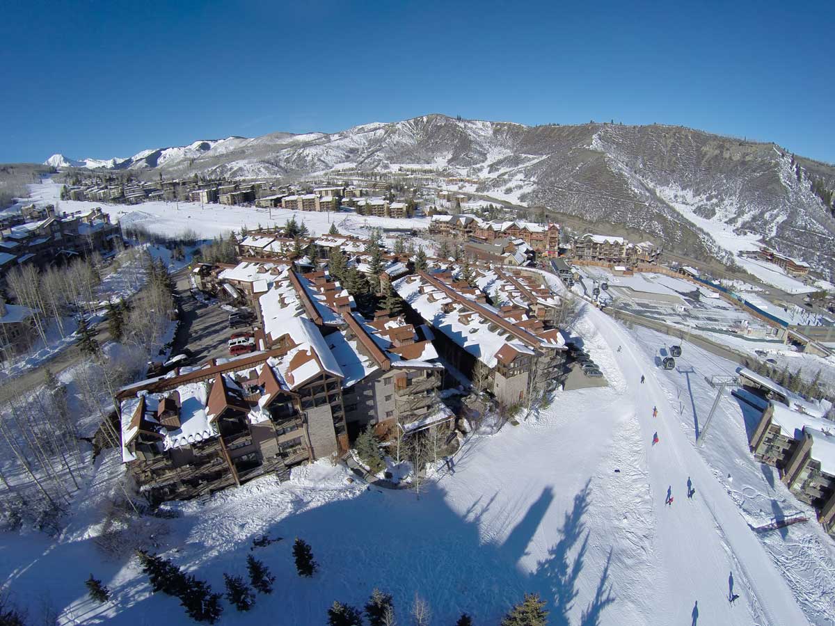 Snow-covered slopes await skiers and snowboarders near The Crestwood Condominiums near Snowmass, Colorado.