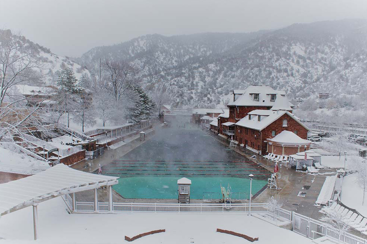 A blanket of snow covers the Glenwood Hot Springs Resort grounds while the hot-spring pool remains steamy in Glenwood Springs, Colorado.