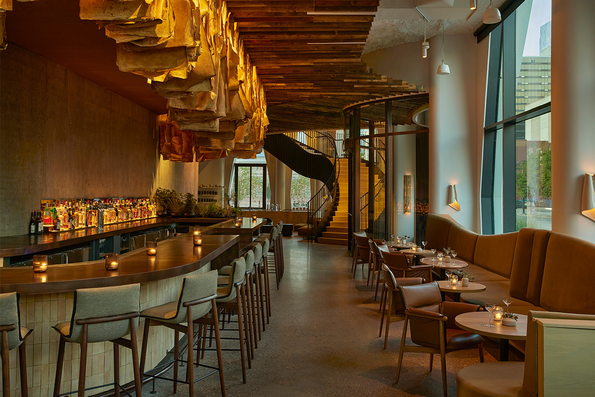 On the ground floor of the Populus hotel in Denver, Colorado, the Pasque Restaurant awaits hungry guests with artistic, nature-inspired decor.