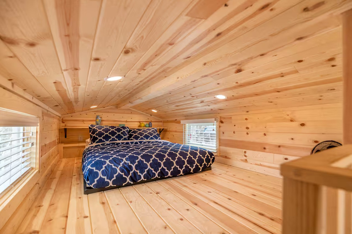 In Fairplay, Colorado, the Tumbleweed offers a plush queen bed in the loft area with two bright windows.