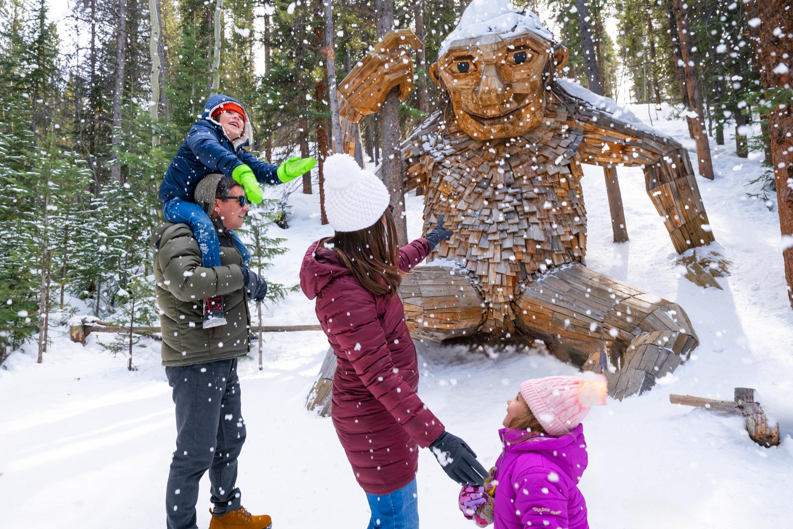A family hikes in Telluride in the show to see a forest troll