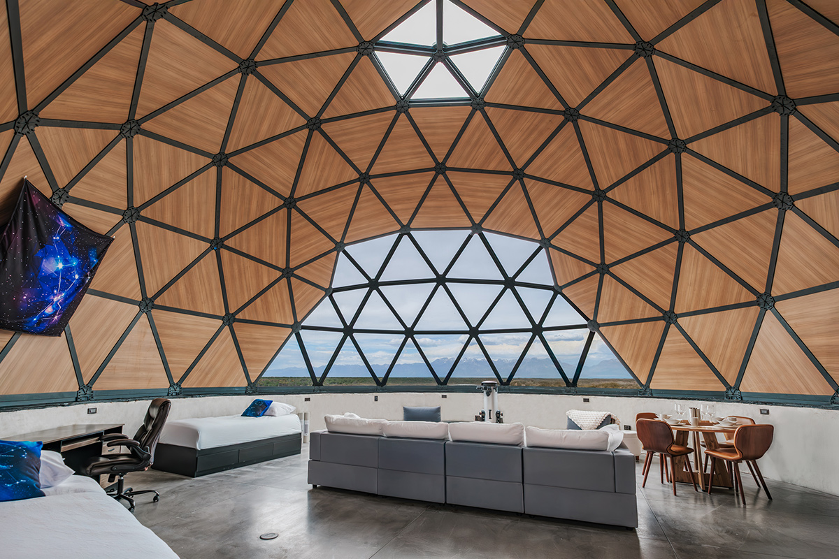 A villa at Kosmos Stargazing Resort & Spa near Mosca, Colorado, features a geometric dome with open spots to view the Colorado sky.