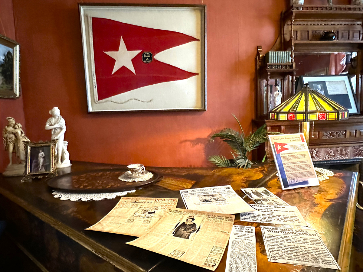 Titanic-era artifacts and newspaper clippings displayed inside the Molly Brown House Museum in Denver.