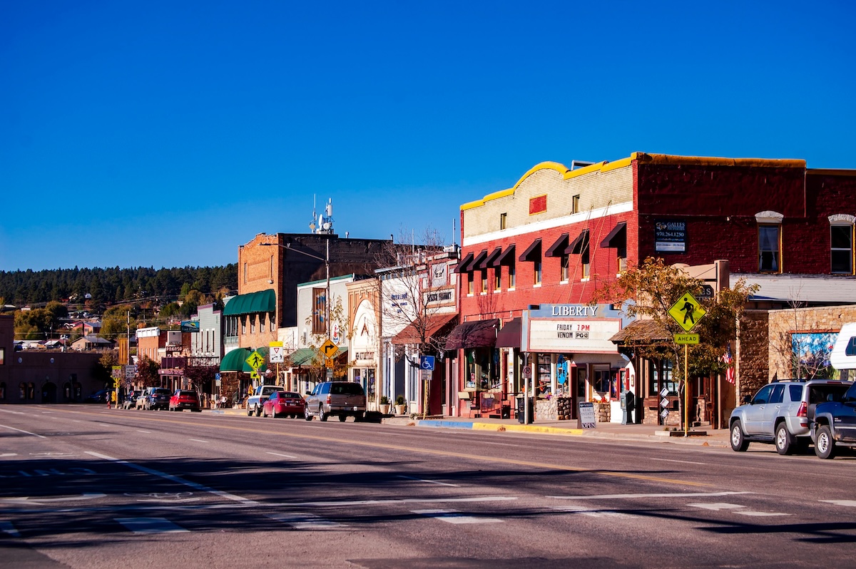 Storefronts and the Liberty Theatre line a street in downtown Pagosa Springs, Colorado.