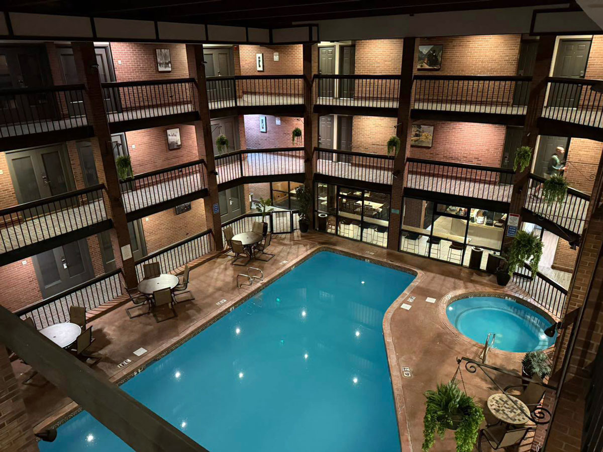 Swimming pool and hot tub surrounded by guest-room balconies at the Best Western Plus Rio Grande Inn in Durango, Colorado
