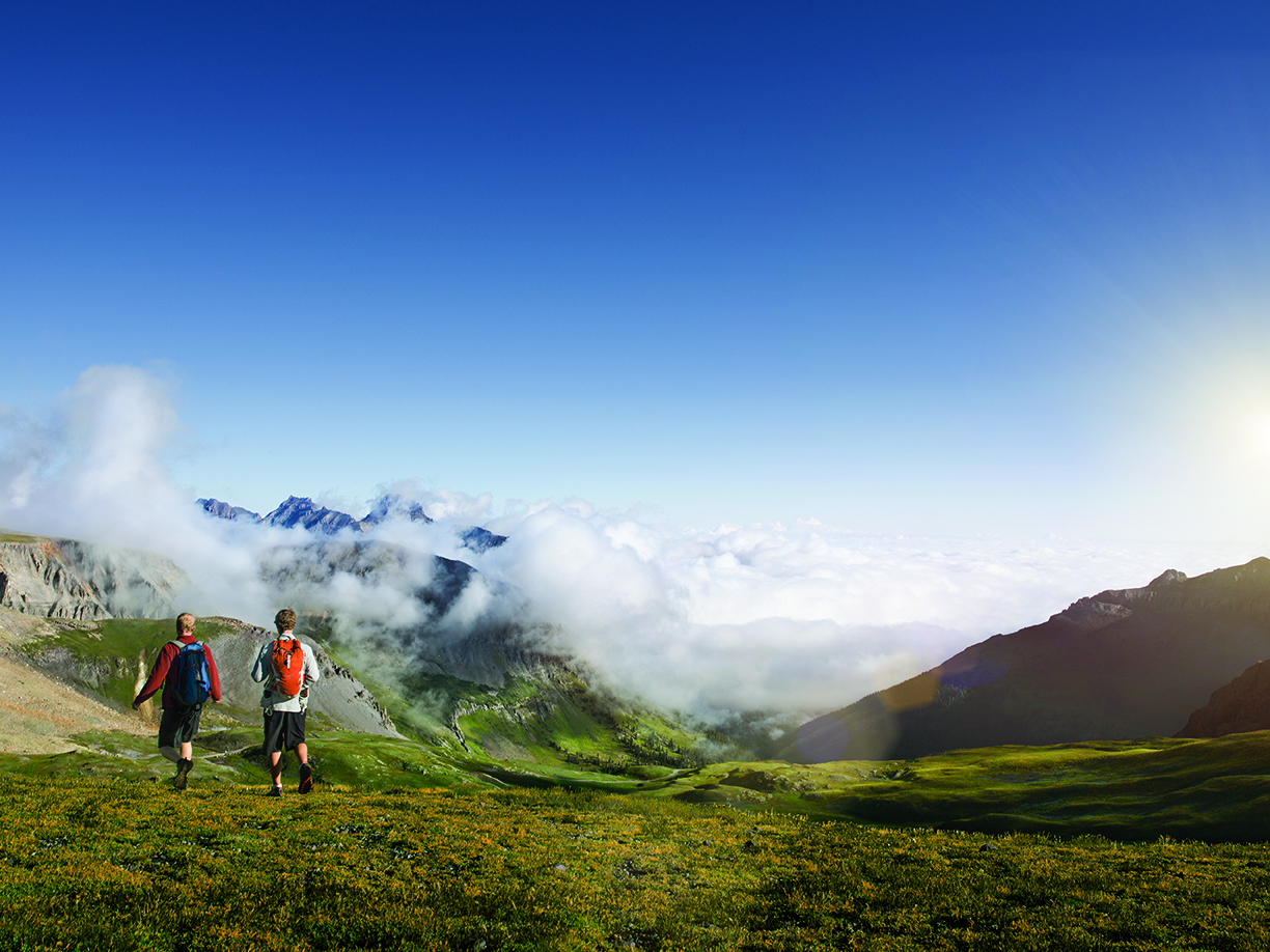 two people hiking in coloradan mountains