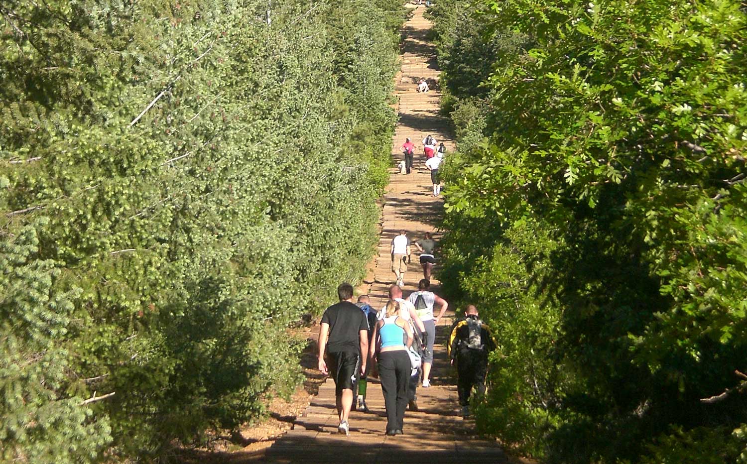 A group of people begin their trek up the Manitou Incline