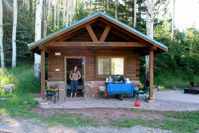 Morning sun shines on a cabin at Sylvan Lake State Park near Eagle, CO
