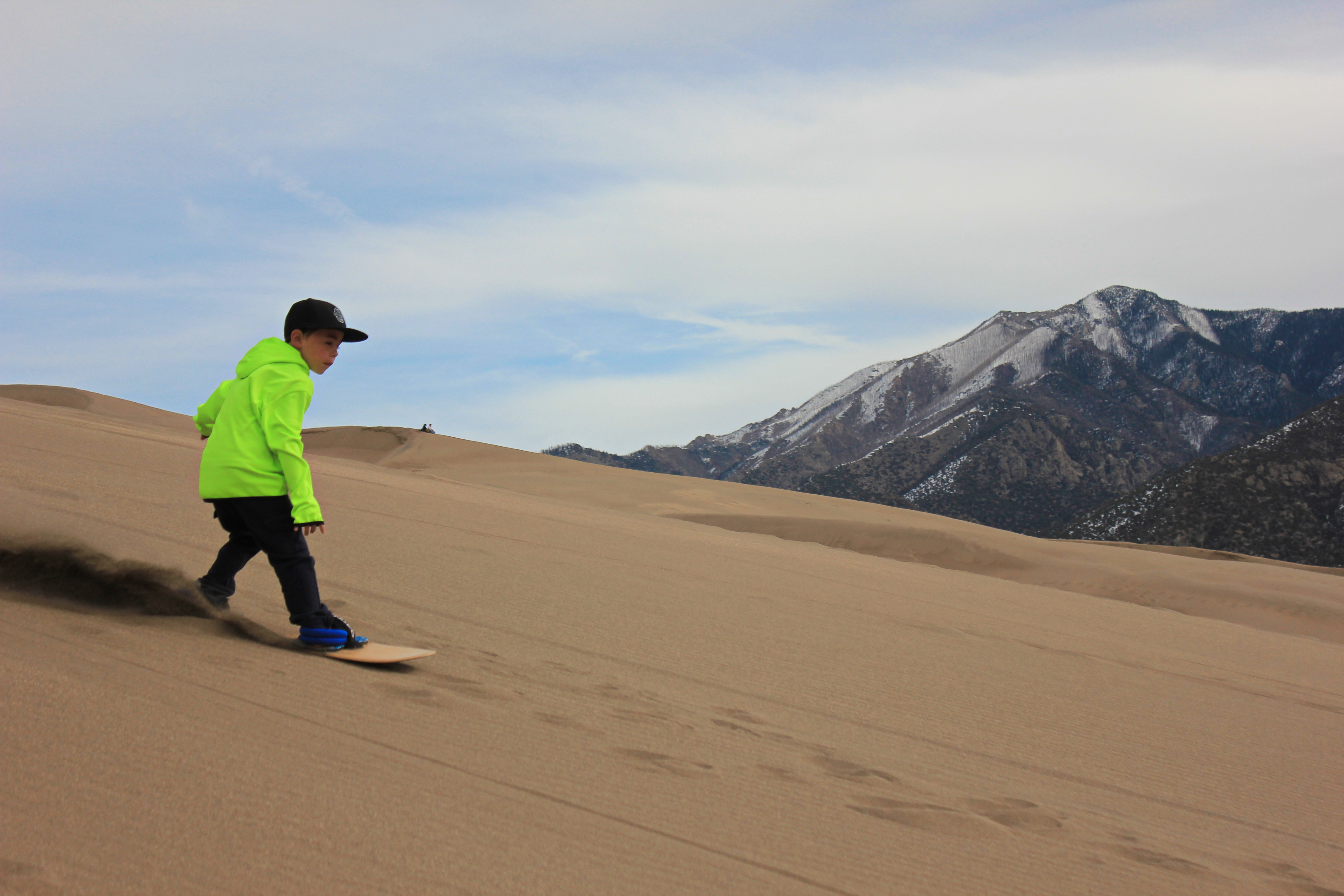 sandboarding the great sand dunes national park photo