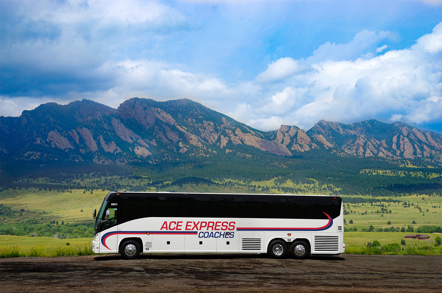 ace express coaches in front of the flatirons photo