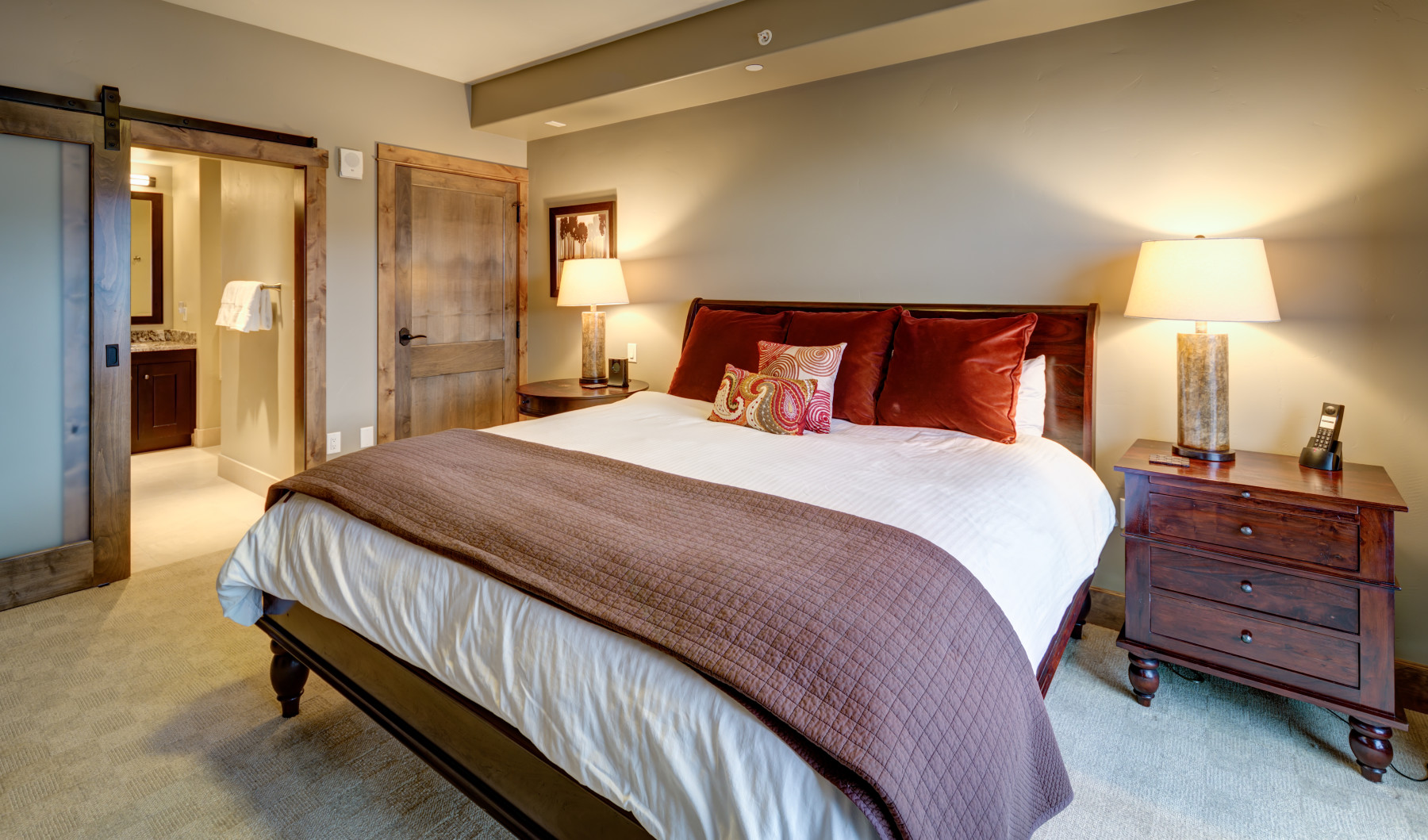 bedroom in a luxury edgemont condo photo 7