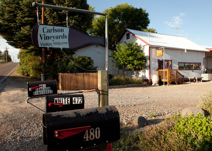 carlson vineyards and winery welcomes you to taste our colorado grown wines. shady back yard, bring a picnic and relax with a glass of your favorite. welcome bicyclists, we are on the fruit and wine byway. photo gjvcb. photo