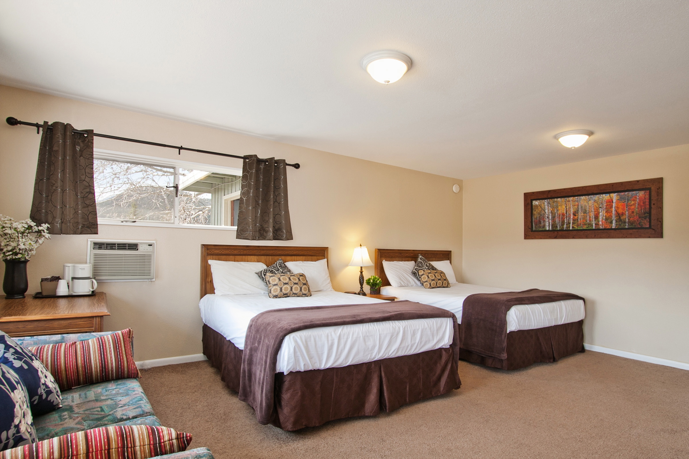 relax in our larger double queen rooms, newly remodeled in 2012. photo