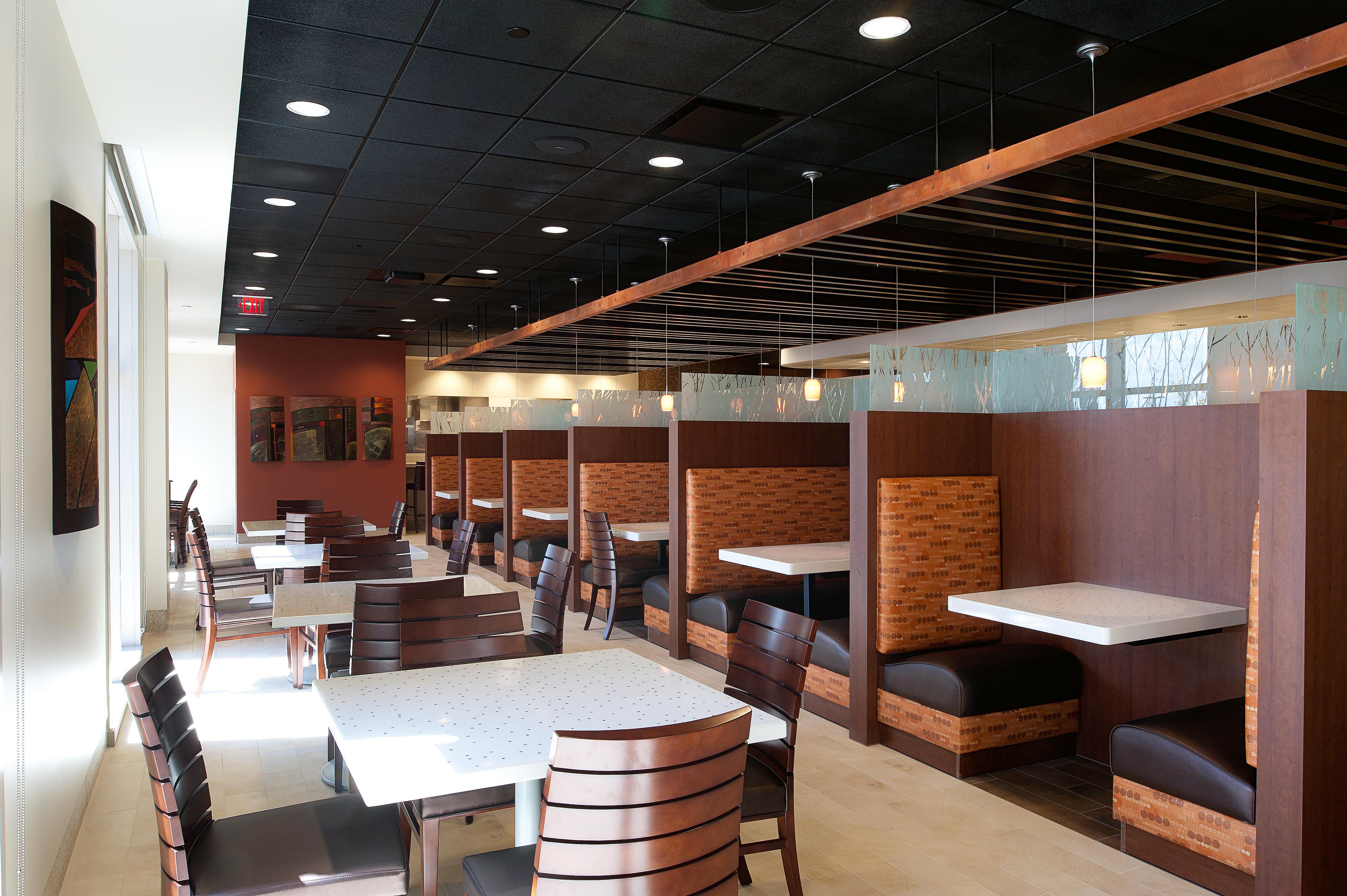 manna is a full service restaurant that features a modern dining room, an ever changing menu and open kitchen where you can watch the chefs make your meal. photo