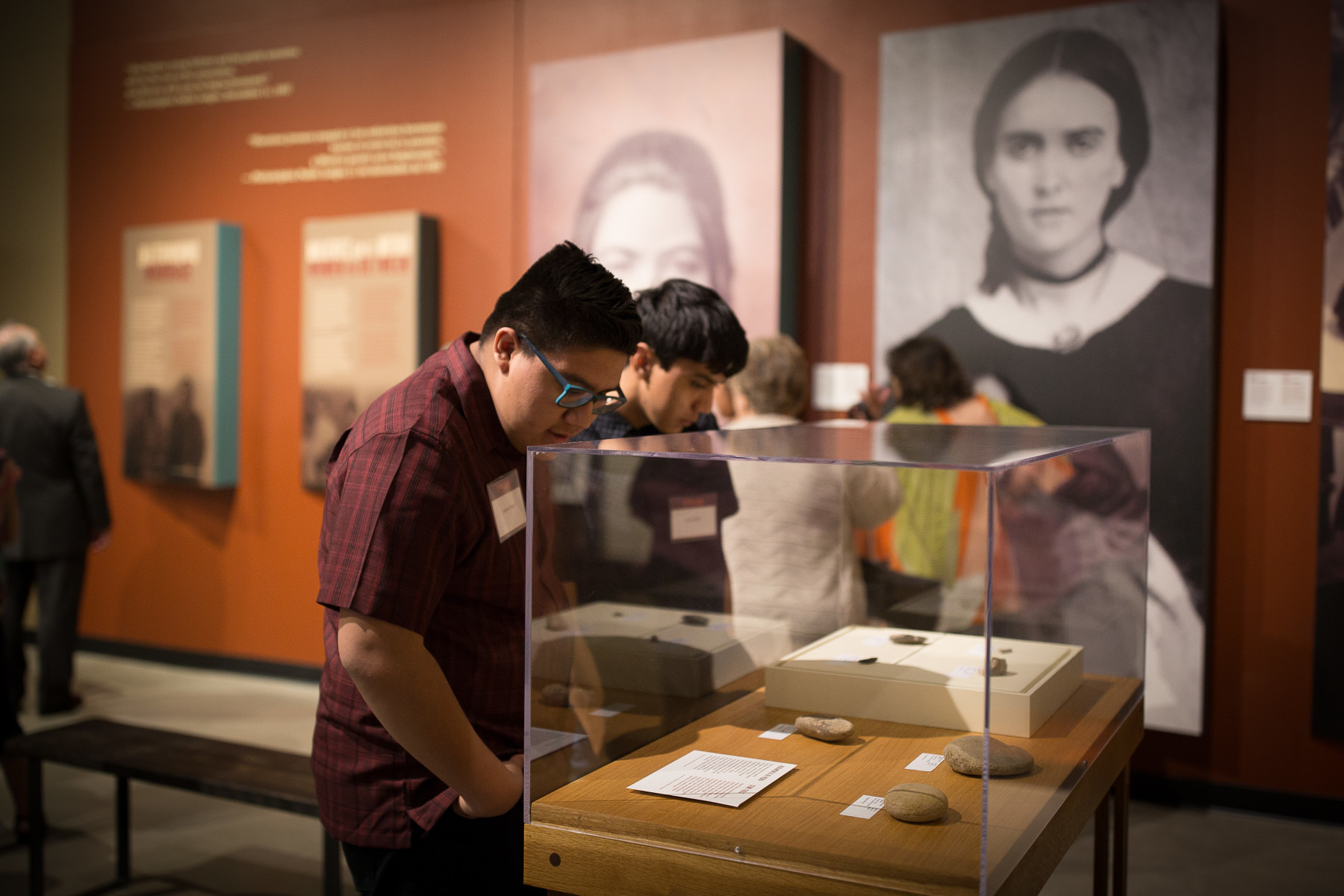 visitors viewing the borderlands of southern colorado exhibit at el pueblo history museum photo 3