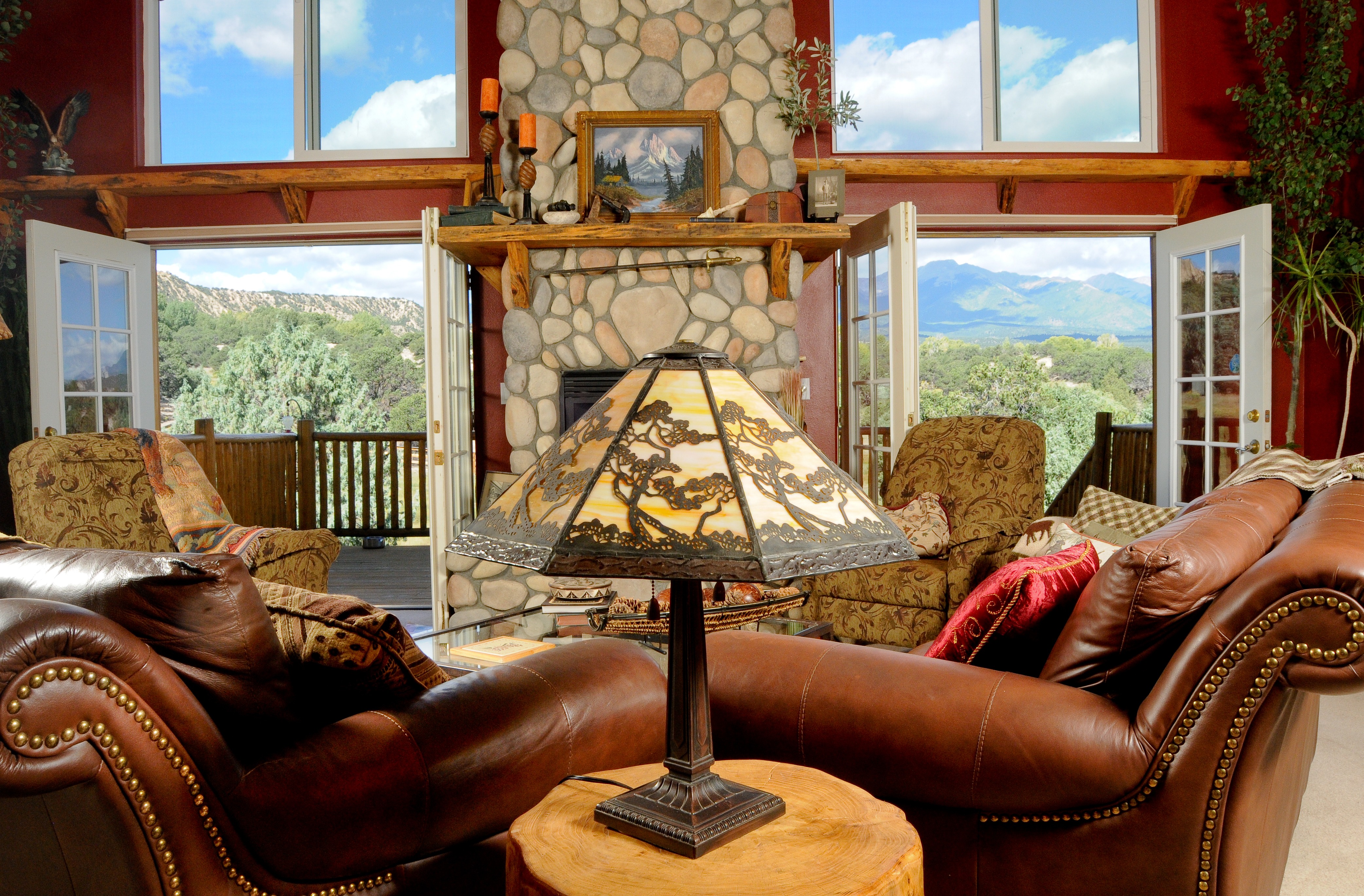 out great room with 2 story fireplace and west facing view. photo