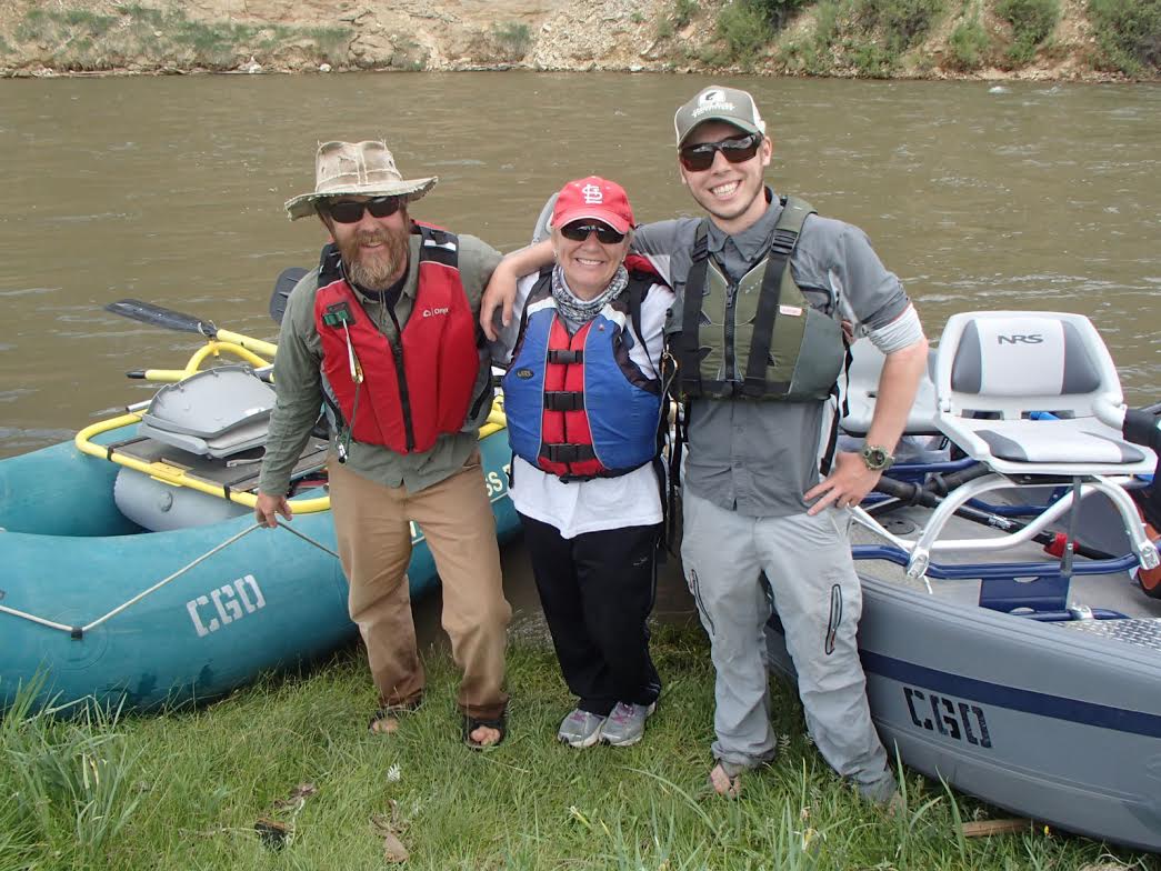 guides with a happy client. photo