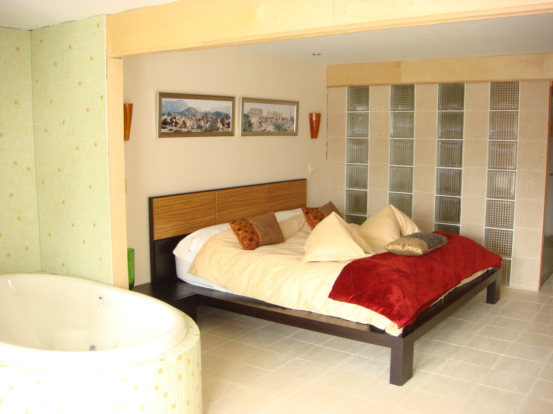 hapi suite - awesome bath with walk-in shower for 2 and glass vanity sink.  mosaic tile in bath and spa areas.  bar unit with microwave and refrigerator. photo