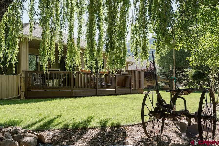 backyard of dalton ranch getaway overlooks peaceful pond photo